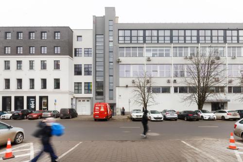 Foto Cozy Top-Floor Apartment with City Views Vilnius 6