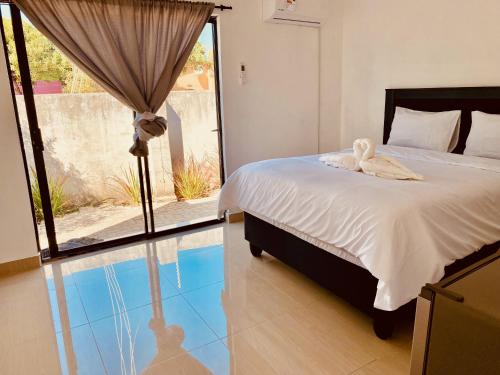 Lova arba lovos apgyvendinimo įstaigoje Sinlu Guesthouse