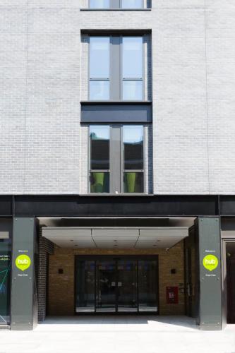 a building with the entrance to a building at hub London - King's Cross in London