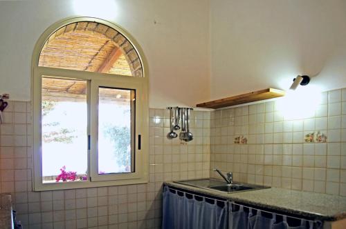 Η κουζίνα ή μικρή κουζίνα στο Villa Alba Appartamenti