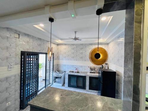 Résidence G में रसोई है