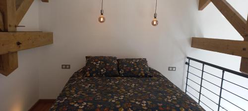 a bedroom with a bed in a room at La Bulle Enchantée in Berru