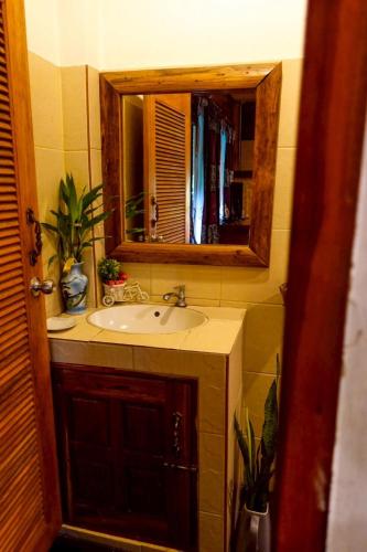 a bathroom with a sink and a mirror at Le mont pai resort in Pai