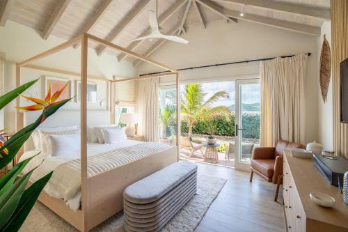 Lova arba lovos apgyvendinimo įstaigoje The Beach House