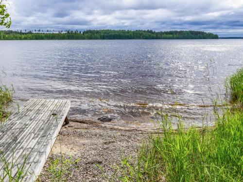 a dock on the shore of a body of water at Holiday Home Leppäranta by Interhome in Harjula