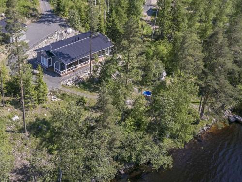 an aerial view of a house next to a river at Holiday Home Paula by Interhome in Lihavanpää
