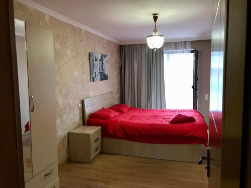 Rúm í herbergi á Homee