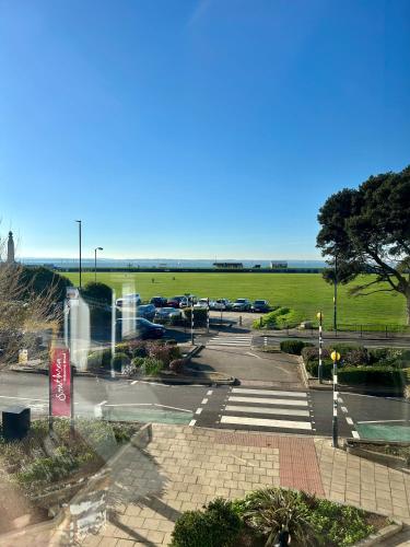 a parking lot with cars parked in a field at Queens Gate in Portsmouth