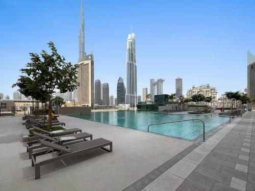 Vogue Vacation Homes, Downtown Views II with Direct Access to Dubai Mall Via a Climate Controlled Bridge, One Bedroom Apartment with Balcony and City View