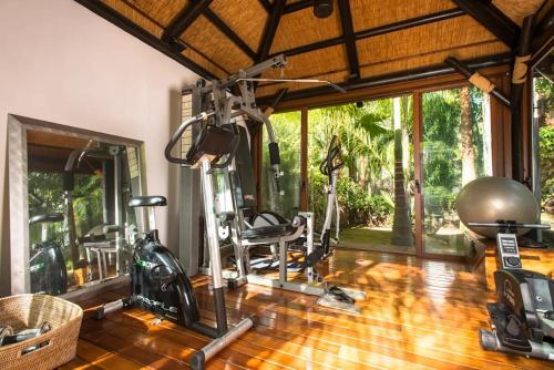 Villa in palm tree plantation, near the beach.