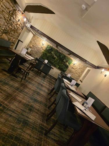 an overhead view of a conference room with tables and chairs at Ye Olde Bowling Green Inn in Bradwell