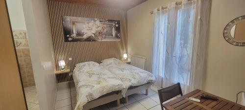 Llit o llits en una habitació de La Claouzo
