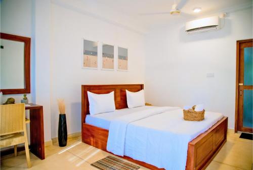 Llit o llits en una habitació de Rupas Hotel