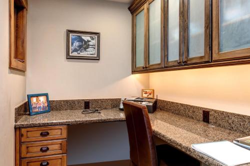 a kitchen with a counter with a phone on it at Abode at Teton Manor in Jackson