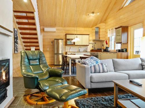 a living room with a couch and a table at Holiday Home Lux iii by Interhome in Salla