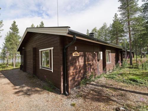 a small cabin in the middle of a forest at Holiday Home Jormakka by Interhome in Levi