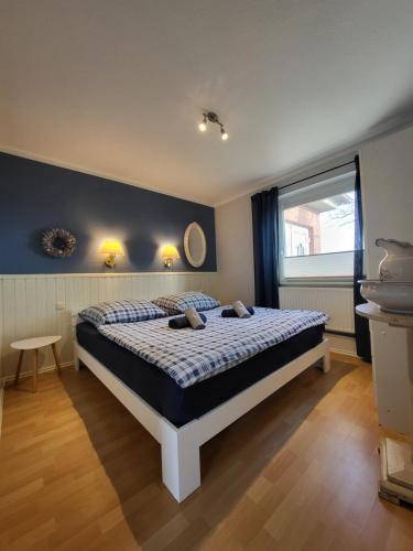 a bedroom with a bed with two pillows on it at 14 Bienenstock - Hof Wiesengrund in Parchtitz