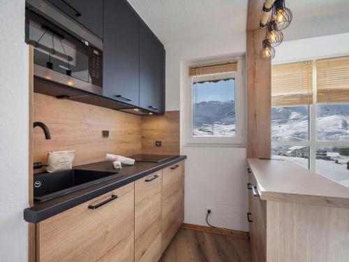 Appartement central aux pieds des pistes à Val Thorens