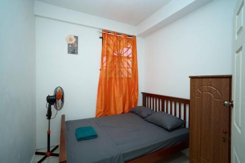 Llit o llits en una habitació de Twyn Apartment