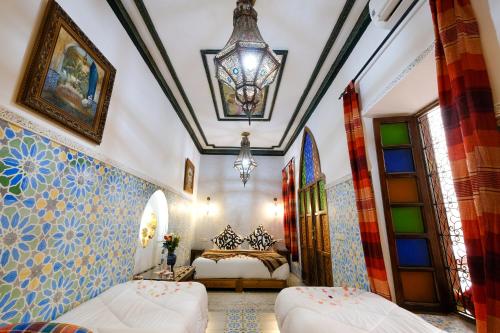 Katil atau katil-katil dalam bilik di Riad Basma Marrakech