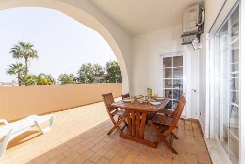 a dining room with a table and chairs at A49 - Anastasia Apartment in Lagos in Lagos