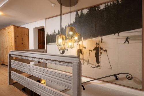 a wall with a picture of a person on skis at Ferienhaus Valsora in Sölden
