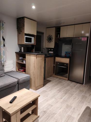 Kuchyň nebo kuchyňský kout v ubytování Mobile-home cosy