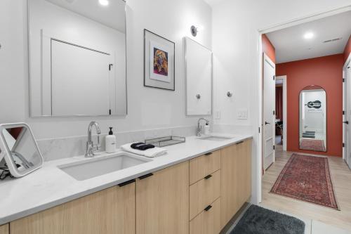a bathroom with a sink and a mirror at Hyve in Nashville
