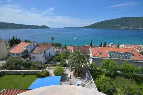 arial view of a town with a large body of water at Hotel Vila Margot in Herceg-Novi