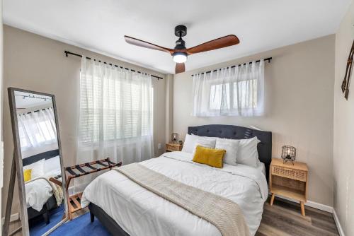 a bedroom with a bed and a ceiling fan at Newly renovated-across the street from Von Stiehl! in Algoma