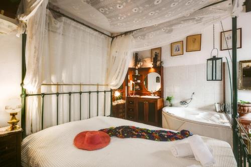 Postel nebo postele na pokoji v ubytování Ifigenia Rooms