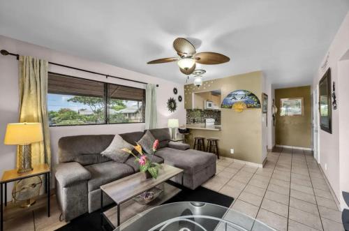 a living room with a couch and a table at Best Deal and Epic Location 2bd 2BA Ocean View in Kihei