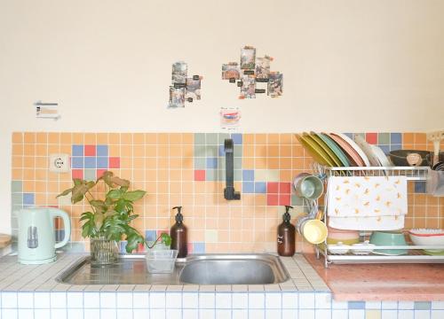a kitchen with a sink and a counter top at MiTS in Bandung