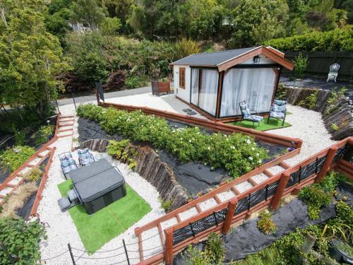 an aerial view of a garden with a gazebo at The Petite Suite in Havelock