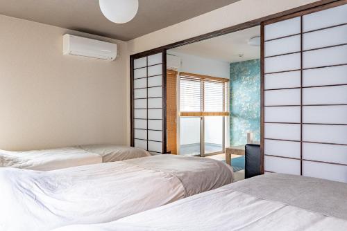 駅徒歩3分 関西主要都市アクセス抜群 京セラ徒歩10分 USJ15分 Zizo House201