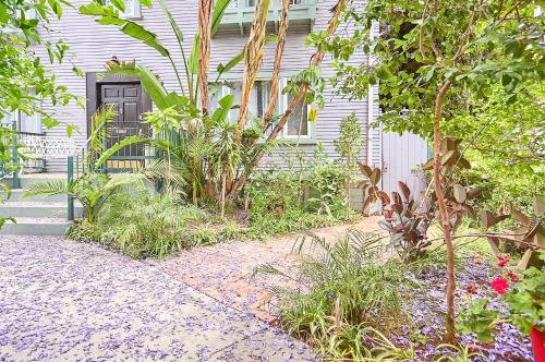 a house with a door and plants in front of it at Hollywood Deluxe Homestay in Los Angeles