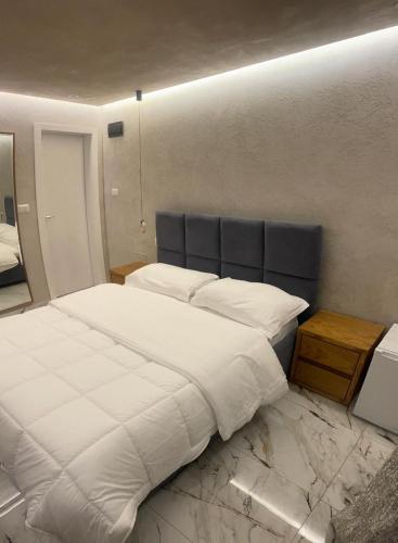 Llit o llits en una habitació de Hotel Piemonte
