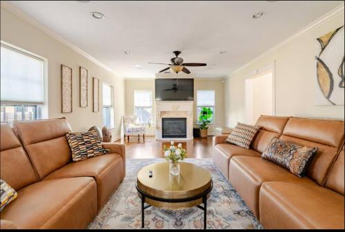a living room with a couch and a tv at Lucky House 2 Tranquility in the Middle of Houston in Houston