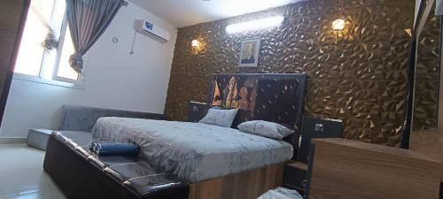 Llit o llits en una habitació de RedSea Realty