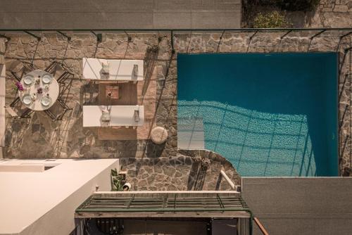 a view of a swimming pool from the top of a building at Istron Luxury Villas in Istro