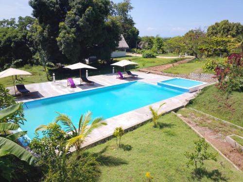 Piscina a Greengardenlodge o a prop