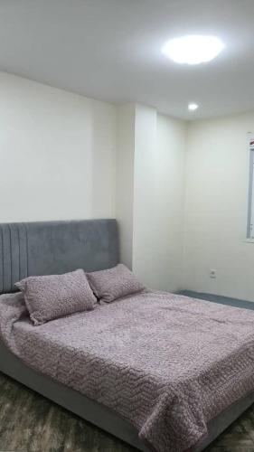 Llit o llits en una habitació de Bon accueil
