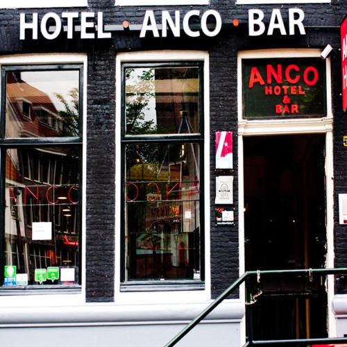 a hotel amoco bar on the side of a building at Hotel Anco in Ons Belang