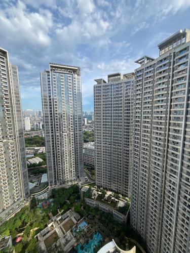an aerial view of a city with tall buildings at 2br Luxury apartment in Jakarta