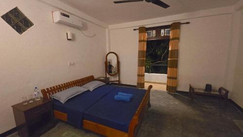 Llit o llits en una habitació de The Reef Edge