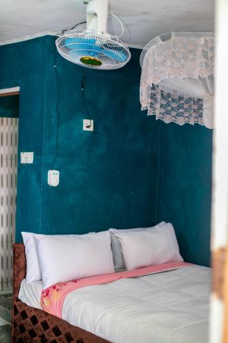 Llit o llits en una habitació de Mount Mulanje Stopover
