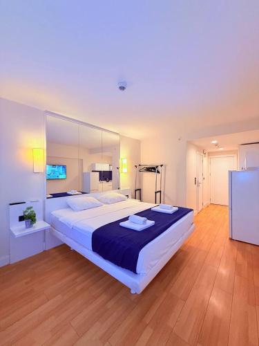 a large bedroom with a large bed in it at ASKO aprtament beach batumi in Batumi