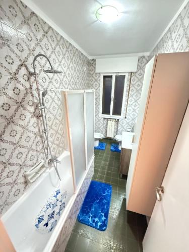 a bathroom with a shower and a bath tub at Casa Raffinata in Mestre