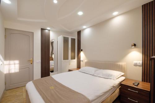 Lova arba lovos apgyvendinimo įstaigoje Time Hotel