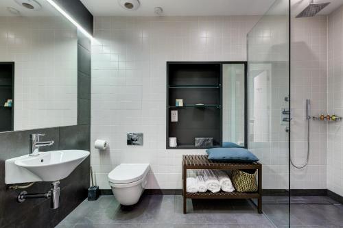 Ett badrum på Hotel 55